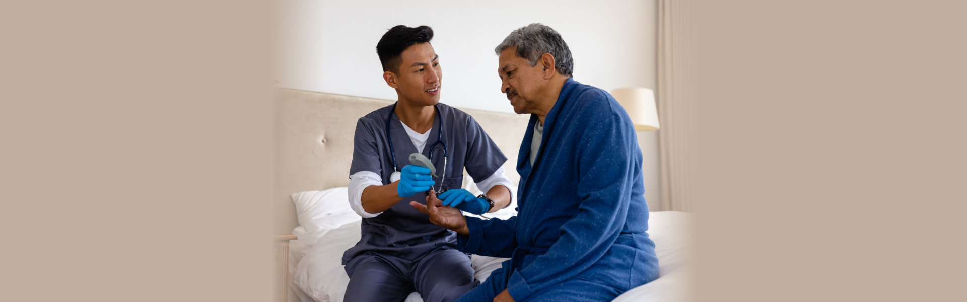 Diverse male doctor testing blood of elderly male patient at home
